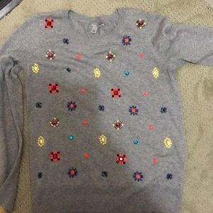 Sweater, with beaded designs.